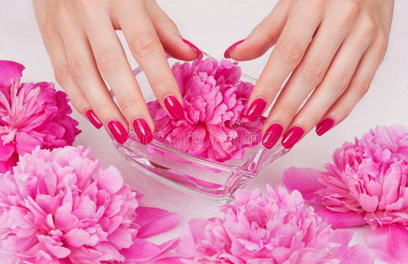 Manicure spa pampering with pink flower