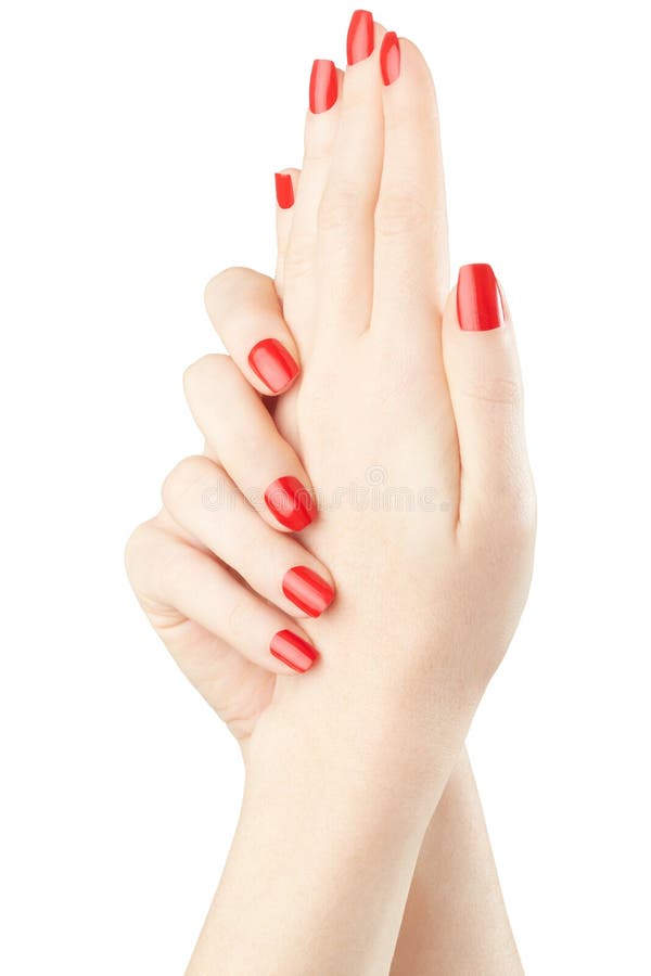 Manicure on female hands with red nail polish isolated on white, clipping path included. Manicure on female hands with red nail polish isolated on white, clipping path included