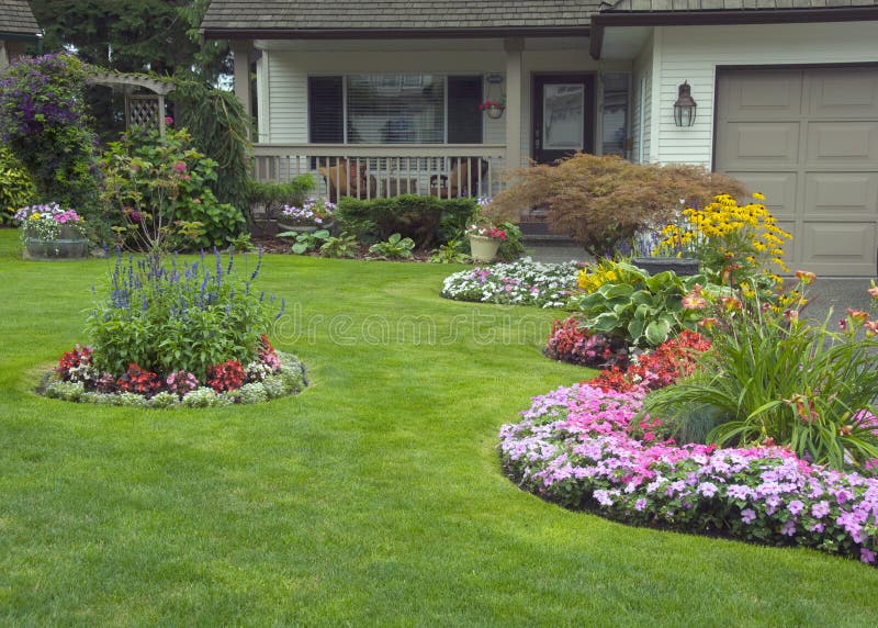 A well kept home with a colourful perennial and annual garden. A well kept home with a colourful perennial and annual garden.