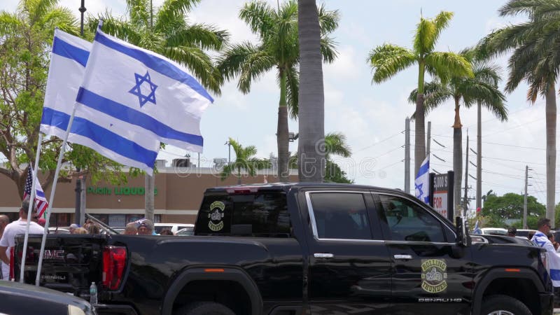 Manifestación de apoyo a israel en el sur de florida banderas en el aire