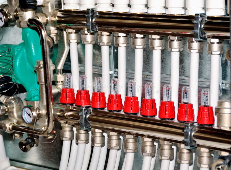 Manifold, collector for heating of a floor stock photo