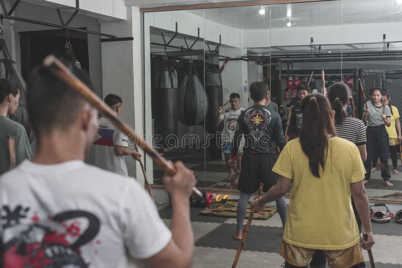 Two Men Sparring With Filipino Stick Fighting Martial Arts Stock Photo,  Picture and Royalty Free Image. Image 38725338.