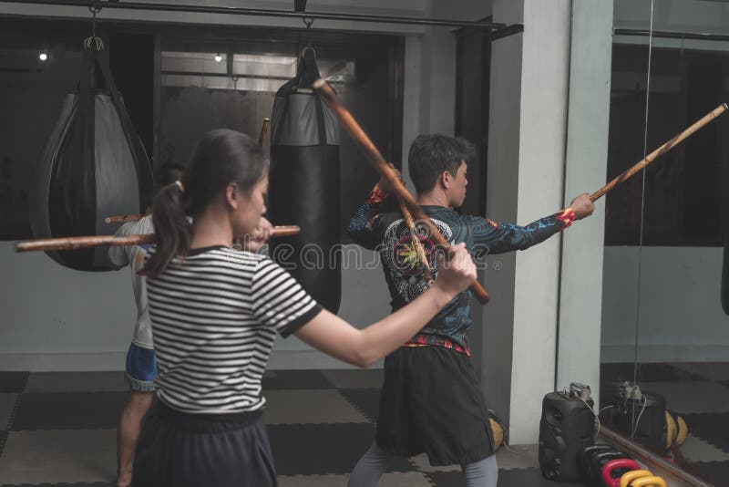 Filipino Martial Arts Instructor Demonstrates Stick Fighting Techniques  Stock Photo - Image of astig, outdoor: 109278684