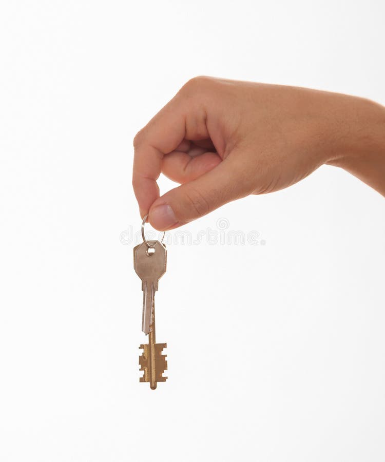 Manlig hand som rymmer en grupp av tangenter arkivfoton Manlig hand som rymmer en grupp av tangenter arkivfoton