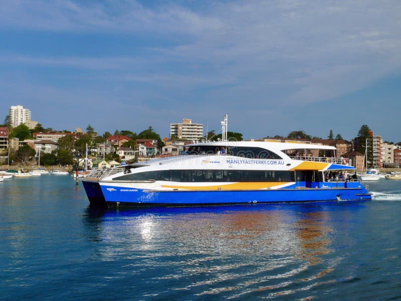 The Manly Fast Ferry cruises into Manly Cove royalty free stock photography