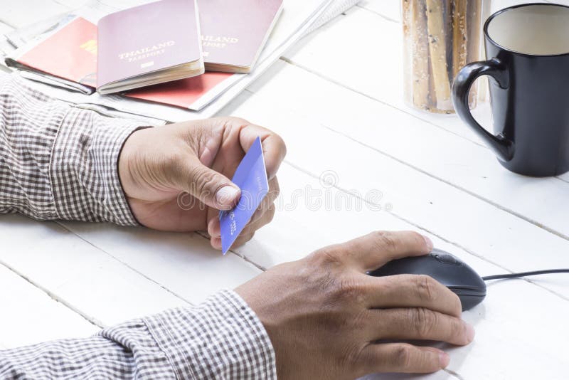 Man using credit card for payment shopping online around travel and journey.1. Man using credit card for payment shopping online around travel and journey.1