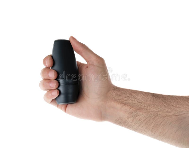 Mann, der Rollerdesodorierendes mittel auf weißem Hintergrund hält stockfoto