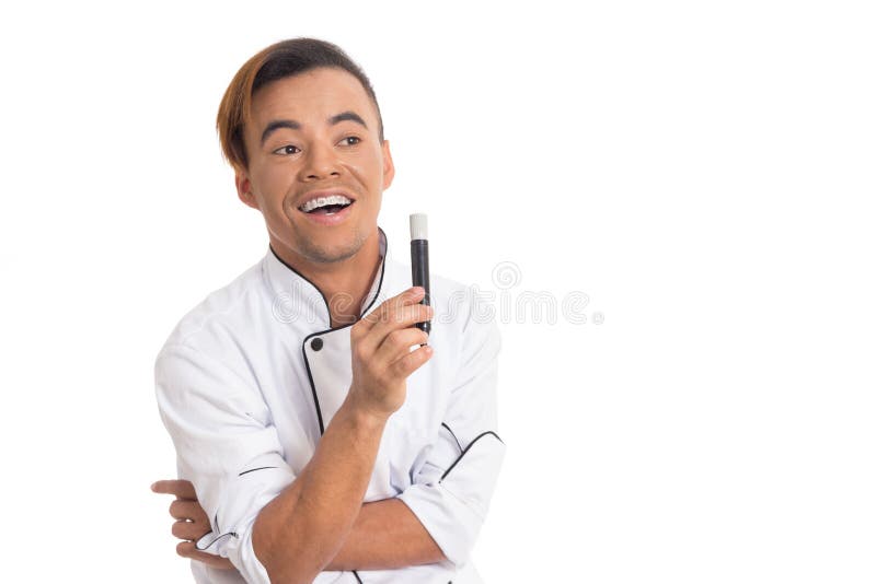Mann hatte eine gute Idee Tragende Arbeitsuniform des Kochs stockfotografie