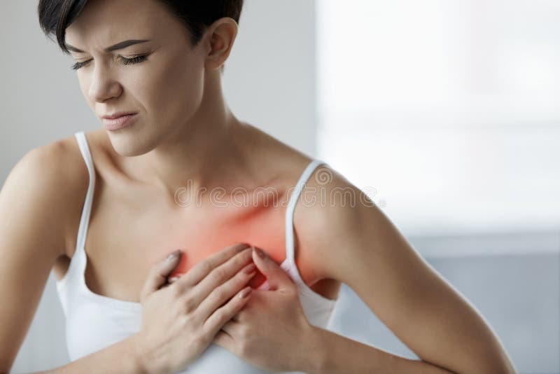 Mann hält für Inneres Schönheits-Gefühls-Schmerz im Kasten-Gesundheitswesen lizenzfreies stockbild Mann hält für Inneres Schönheits-Gefühls-Schmerz im Kasten-Gesundheitswesen lizenzfreies stockbild