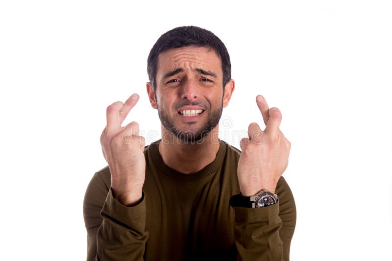 Mann mit den Fingern gekreuzt stockfotografie Mann mit den Fingern gekreuzt stockfotografie