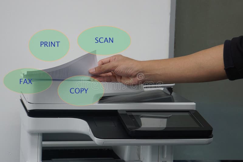 Close up man with paper on multi functional printer to print, scan, copy and fax in office. Close up man with paper on multi functional printer to print, scan, copy and fax in office