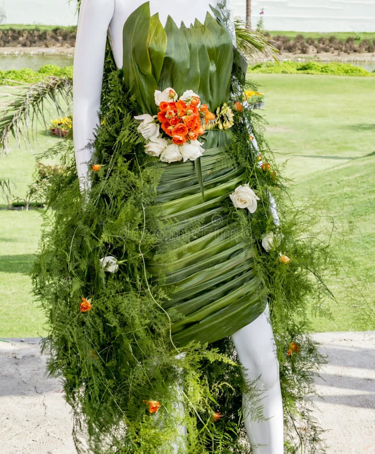 Mannequin Covered with Leaves and Flowers Stock Photo - Image of ...