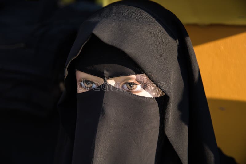 Mannequin wearing muslim traditional black clothing