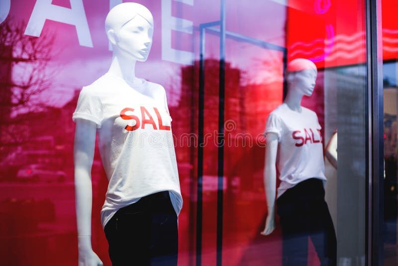 Mannequins with Sale Sign in a Shop. Stock Image - Image of mall ...