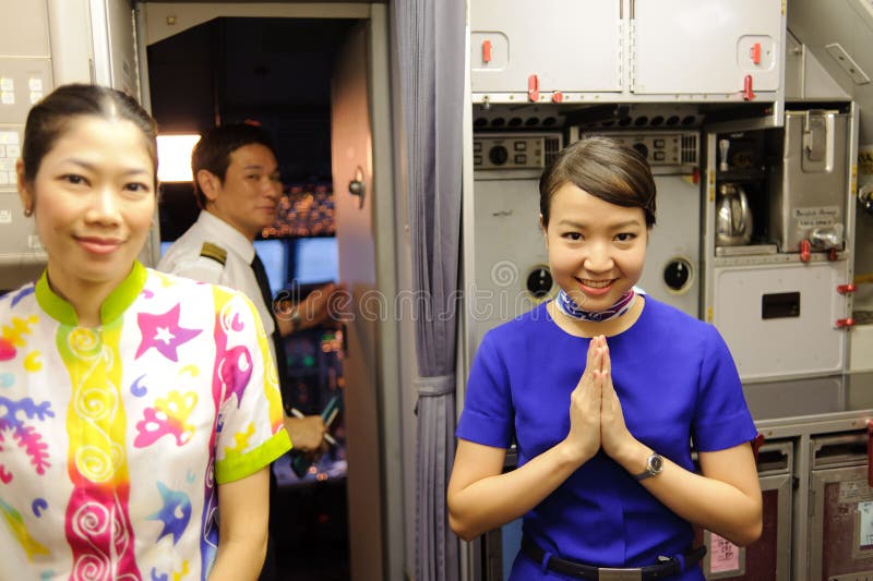 Mannschaftsmitglieder von Bangkok-Luft stockbild Mannschaftsmitglieder von Bangkok-Luft stockbild