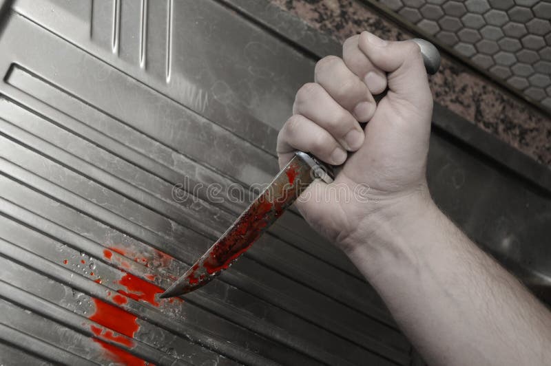Mano con el cuchillo sangriento imágenes de archivo libres de regalías Mano con el cuchillo sangriento imágenes de archivo libres de regalías