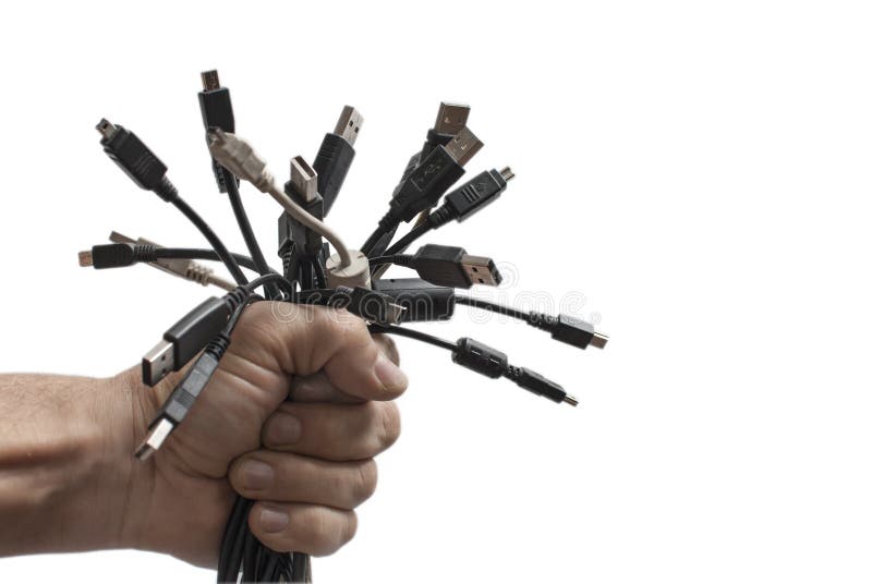 Mano con los enchufes del USB fotografía de archivo libre de regalías Mano con los enchufes del USB fotografía de archivo libre de regalías