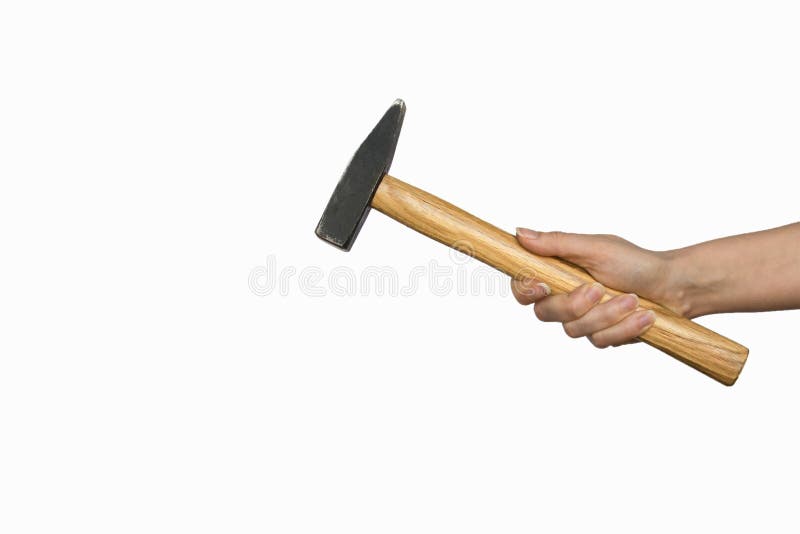 Mano contenente un martello di acciaio e di legno isolato su fondo bianco fotografia stock Mano contenente un martello di acciaio e di legno isolato su fondo bianco fotografia stock