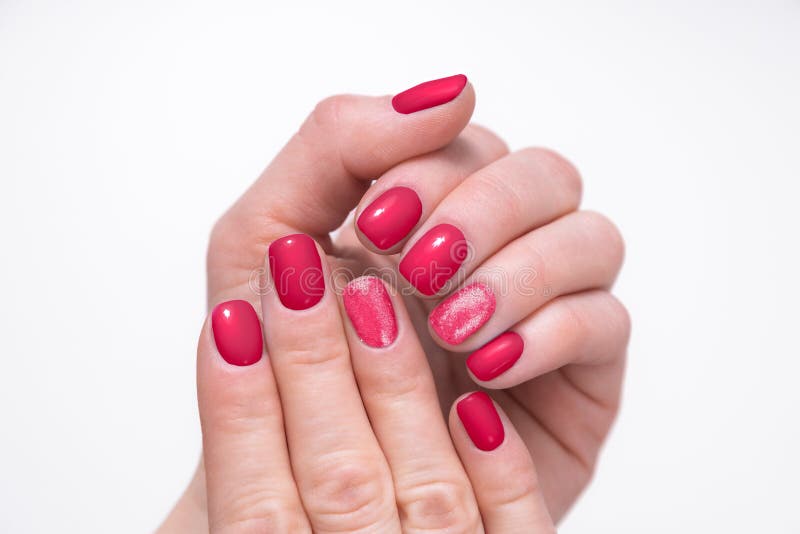 Woman hands with manicure on white background, viva magenta 2023. Woman hands with manicure on white background, viva magenta 2023.
