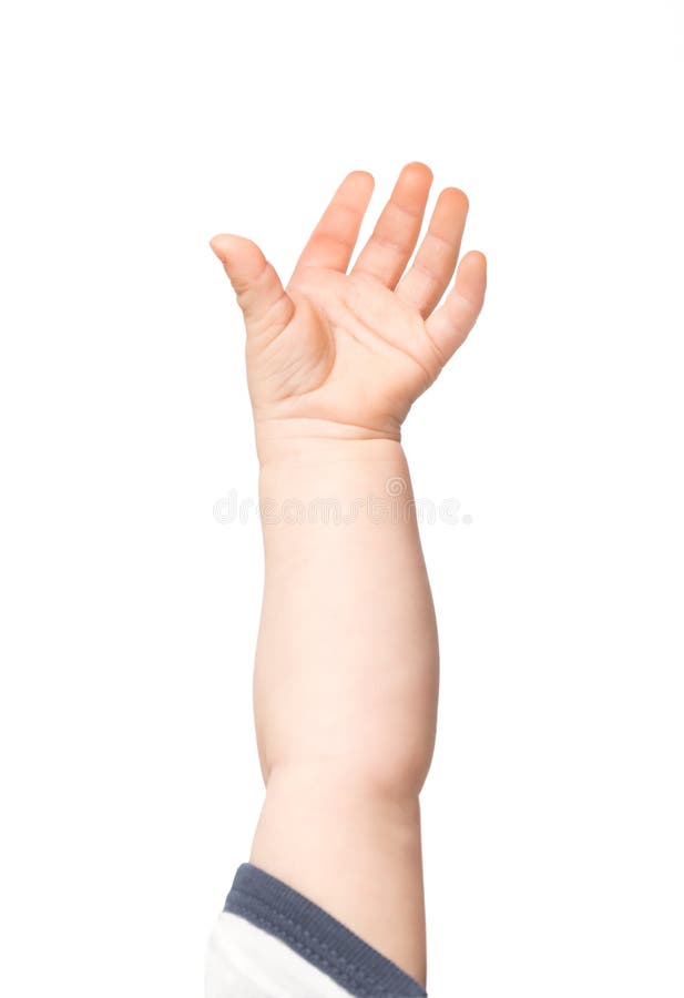 Mano del bambino che raggiunge fuori fotografie stock Mano del bambino che raggiunge fuori fotografie stock