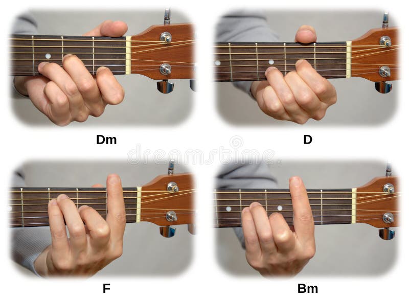 Mano del guitarrista que juega acordes de la guitarra: Dm, D, F, Bm
