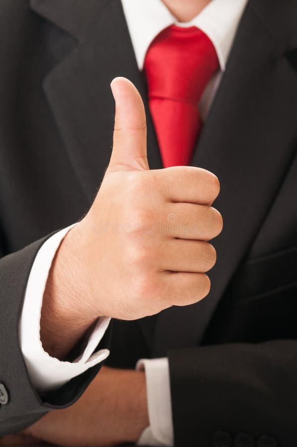Mano dell'uomo di affari che mostra segno GIUSTO immagini stock Mano dell'uomo di affari che mostra segno GIUSTO immagini stock