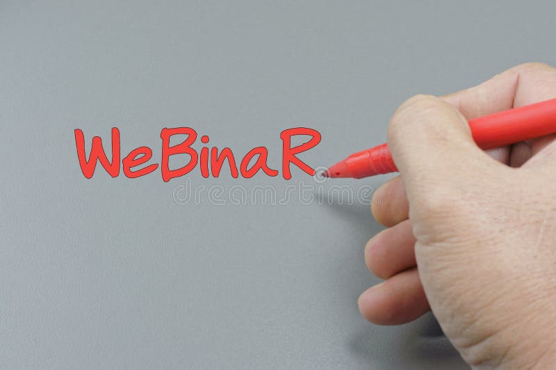 Mano que escribe Webinar - concepto del negocio fotografía de archivo libre de regalías Mano que escribe Webinar - concepto del negocio fotografía de archivo libre de regalías