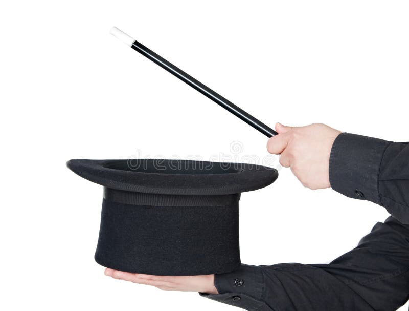 Manos del mago con la varita mágica y el sombrero superior imagen de archivo libre de regalías Manos del mago con la varita mágica y el sombrero superior imagen de archivo libre de regalías