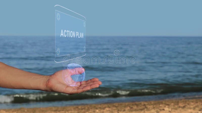 Manos en plan de actuación del texto del holograma del control de la playa