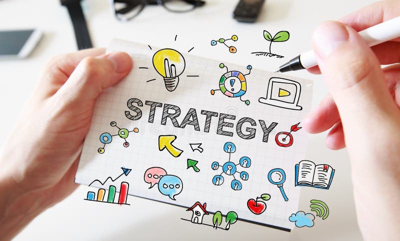 Mans hand drawing Strategy concept on notebook royalty free stock image Mans hand drawing Strategy concept on notebook royalty free stock image