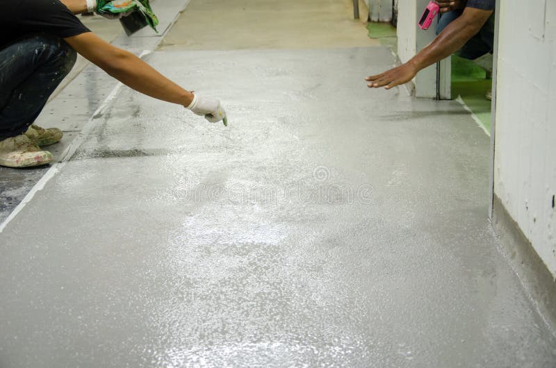 Mans work epoxy floor stock photos Mans work epoxy floor stock photos
