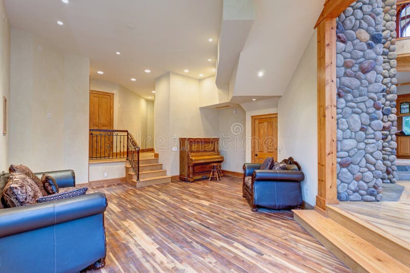 Mansion hallway interior with mixed wood floors