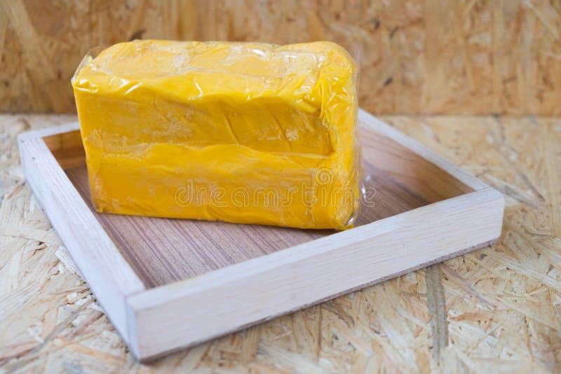 Mantequilla entera del bloque imagenes de archivo