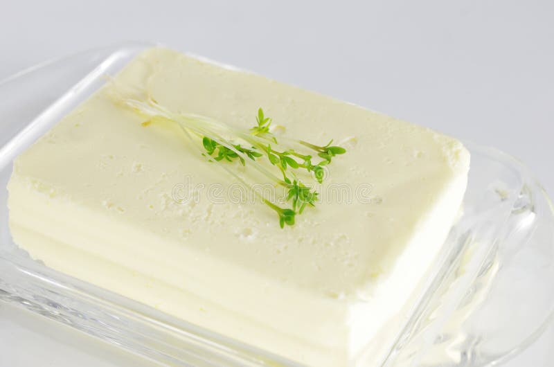 Mantequilla entera del bloque fotos de archivo