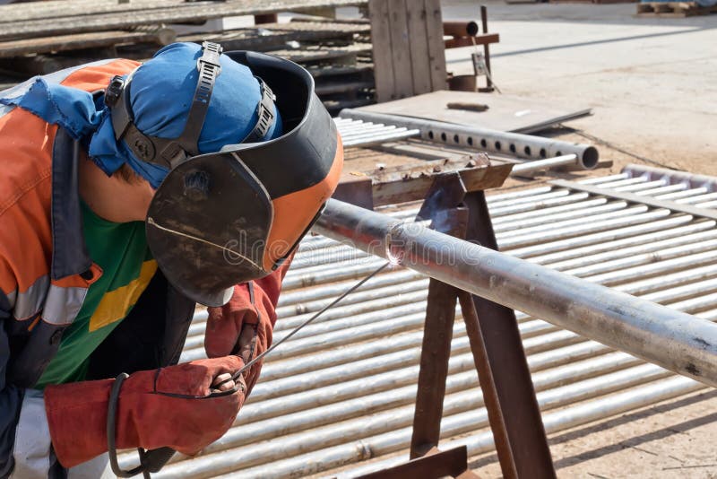 Manual Arc Welding of Stainless Steel Pipe Stock Photo Image of flame