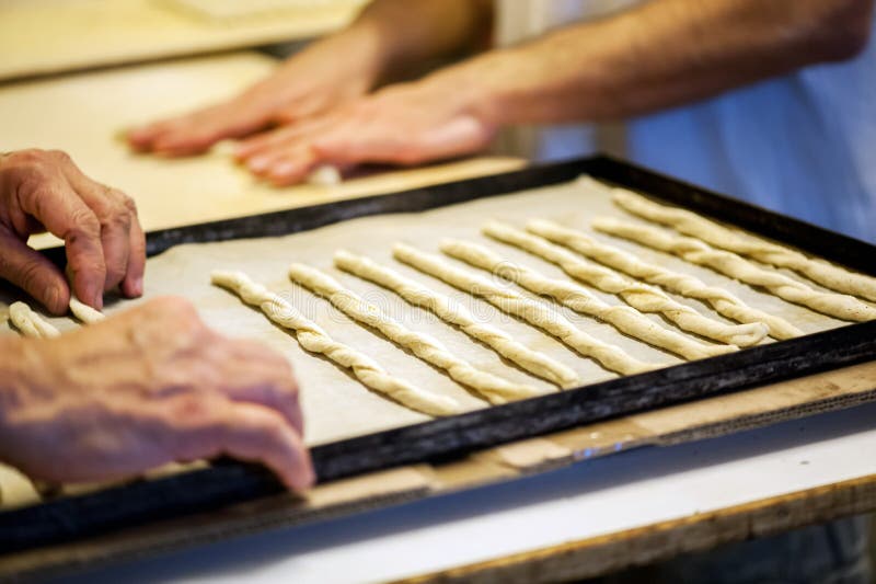 Baker Placing Breadsticks on Baking Tray Stock Image Image of bread
