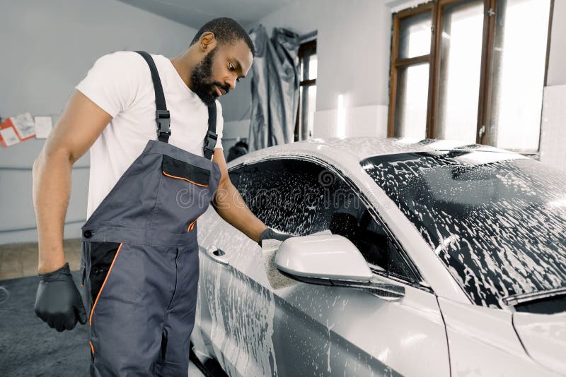 Manual Washing Of A Car With Soap And Sponge Young Professional African Man Worker In Protective Clothes And Rubber Stock Image Image Of Equipment Shine Manual Washing Of A Car With Soap And Sponge Young Professional African Man Worker In Protective Clothes And Rubber Stock Image Image Of Equipment Shine