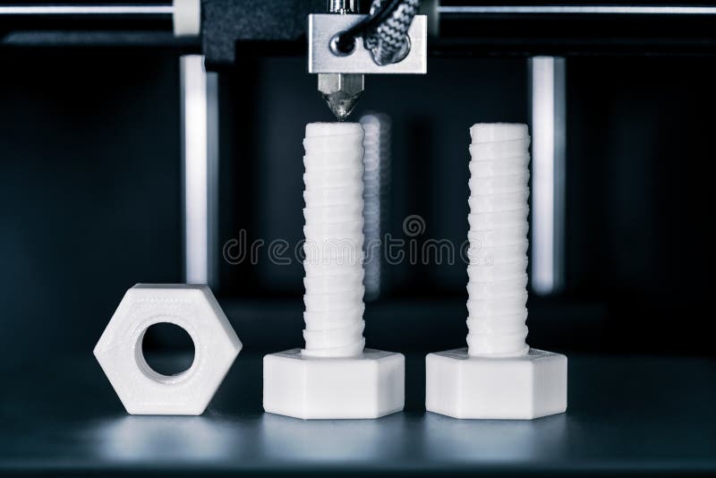 Manufacture of screws and nuts with a 3D printer royalty free stock image