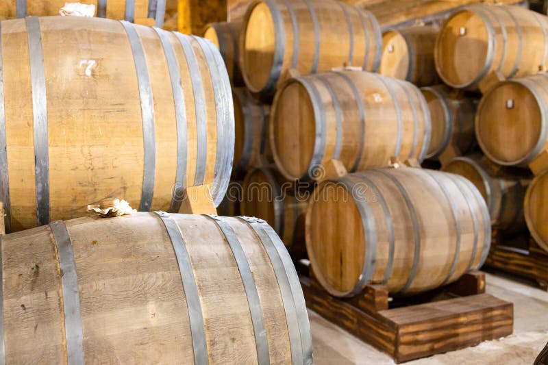 Yerevan, Armenia - October 2, 2023: many wooden barrels with brandy in cellar of NOY factory in Yerevan. Noy is the oldest Yerevan factory for production of Armenian cognac, it was founded in 1877. Cognac production stock images, royalty-free photos and pictures
