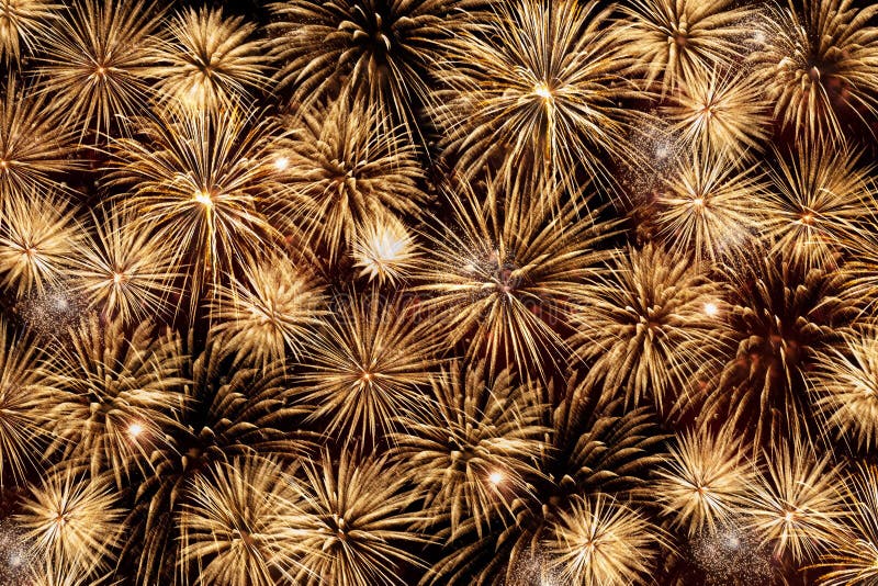 Many beautiful Golden fireworks exploding in the night sky royalty free stock photography Many beautiful Golden fireworks exploding in the night sky royalty free stock photography