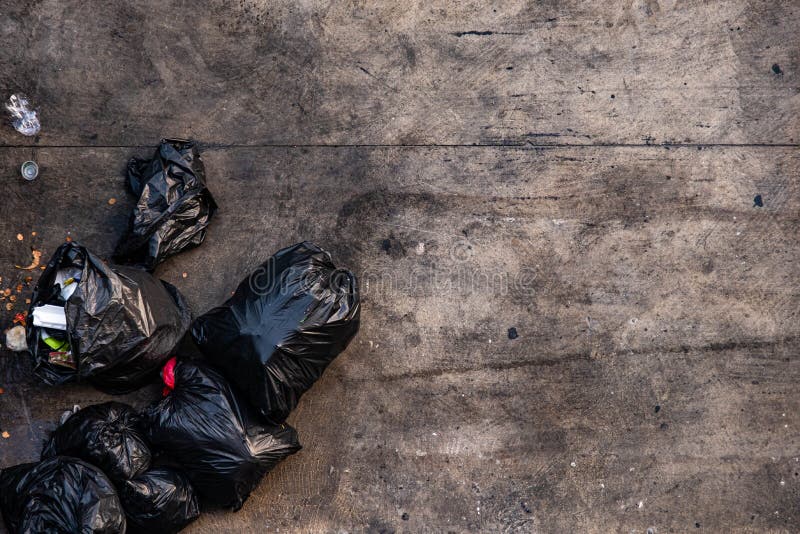 Garbage bags. Waste, black garbage bags plastic pile stack. Lots pile of garbage  bags stack. by KYNA STUDIO. Photo stock - StudioNow