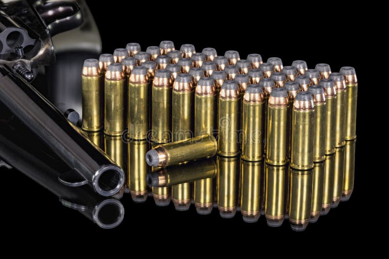 Many Brass and Copper Bullets with a Handgun Stock Image Image of