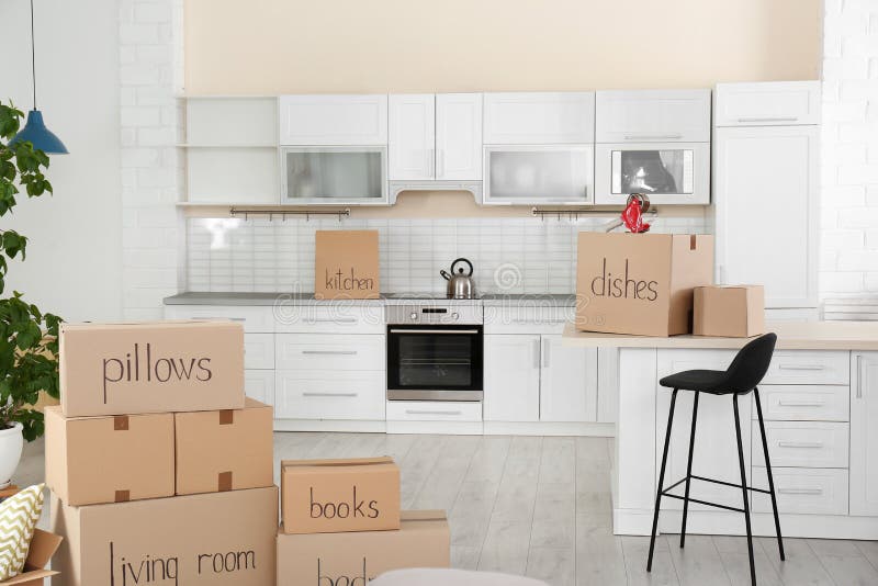 Many Cardboard Boxes in Kitchen Stock Photo Image of pillow, pack