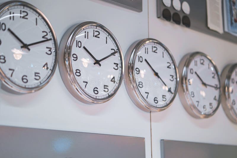 Many Different Wall Clock On The Wall Stock Photo Image of hurry