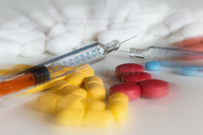 Many Colored Drug Pills With Injection Pins Stock Photo Image of