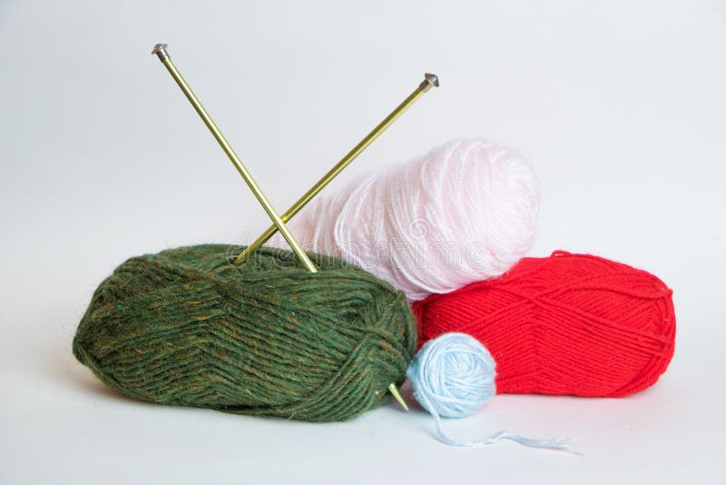 Crossed knitting needles stock photo. Image of material - 24445438