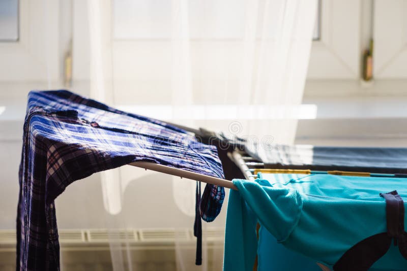 Colorful Clothes On Drying Rack Stock Photo Image Of