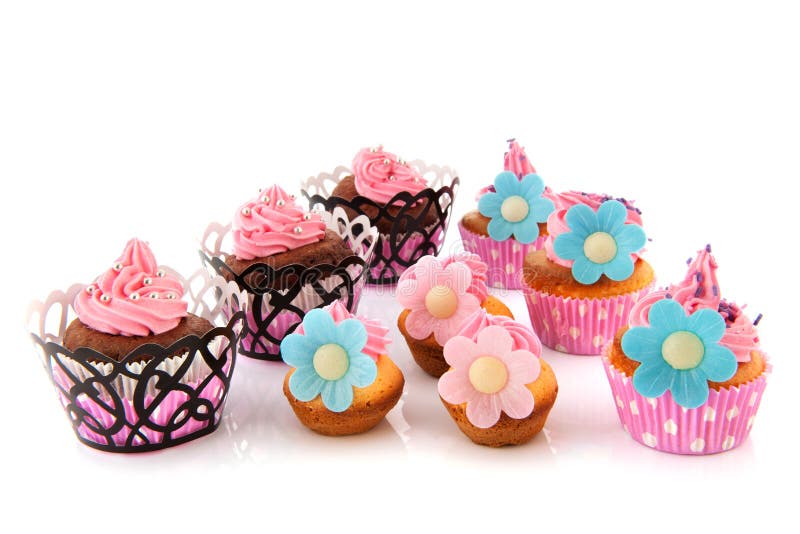 Many colorful cupcakes stock image