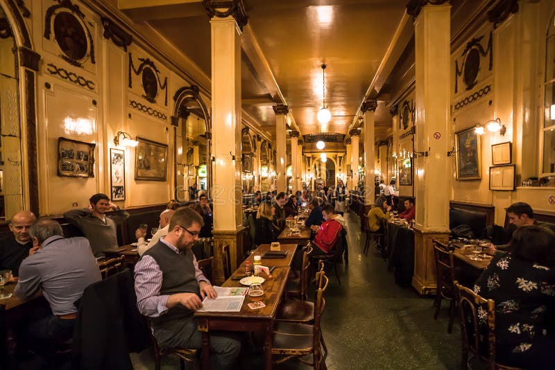 BRUSSELS, BELGIUM: Many customers of the old bar talking and drinking beer, inside vintage decorations on November 12, 2018. More than 1,200,000 people lives in Brussels