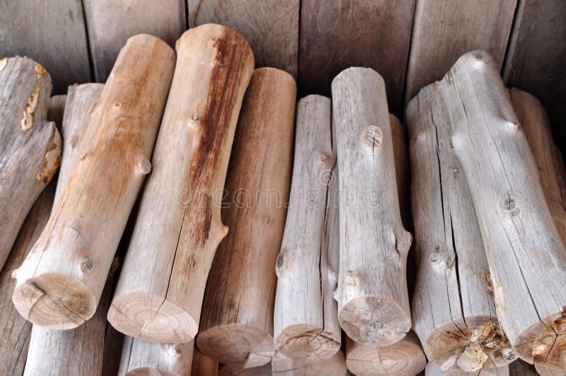 Many fire woods and small logs arranging royalty free stock photography